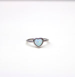 925 sterling silver ring, rhodium plating. heart shaped ring with lab made opal stone.
