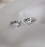 real cubic zirconia heart shaped, with min cubic zirconia on platinum plated huggie earrings