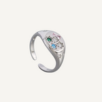 925 sterling silver adjustable ring with multi coloured cubic zirconia, blue, green clear and pink cubic zirconia