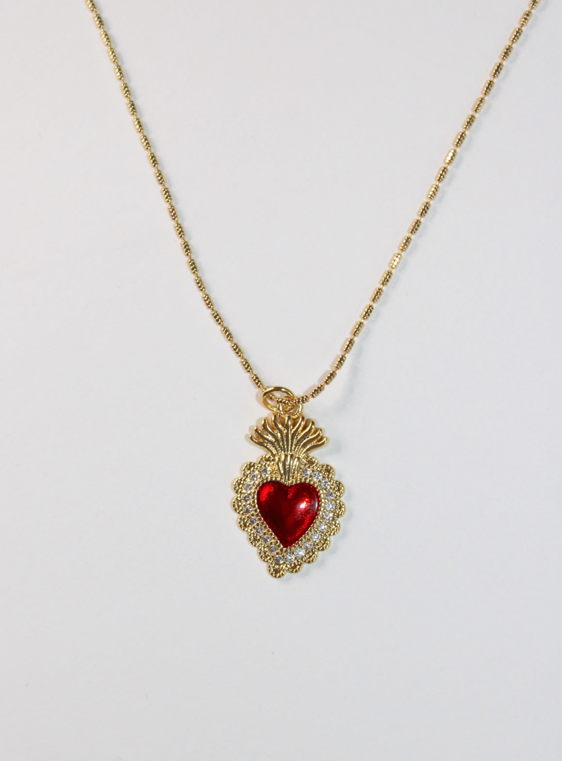heart with crown necklace with red gem. stainless steel chain