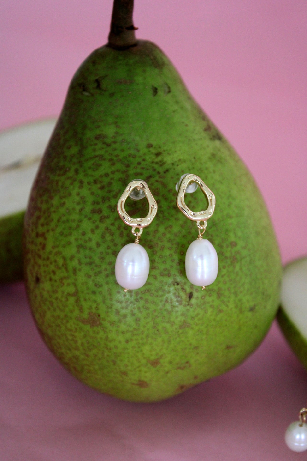 organic oval / pear changed molten style studs with cut out, with real freshwater walls. real 18k gold plated