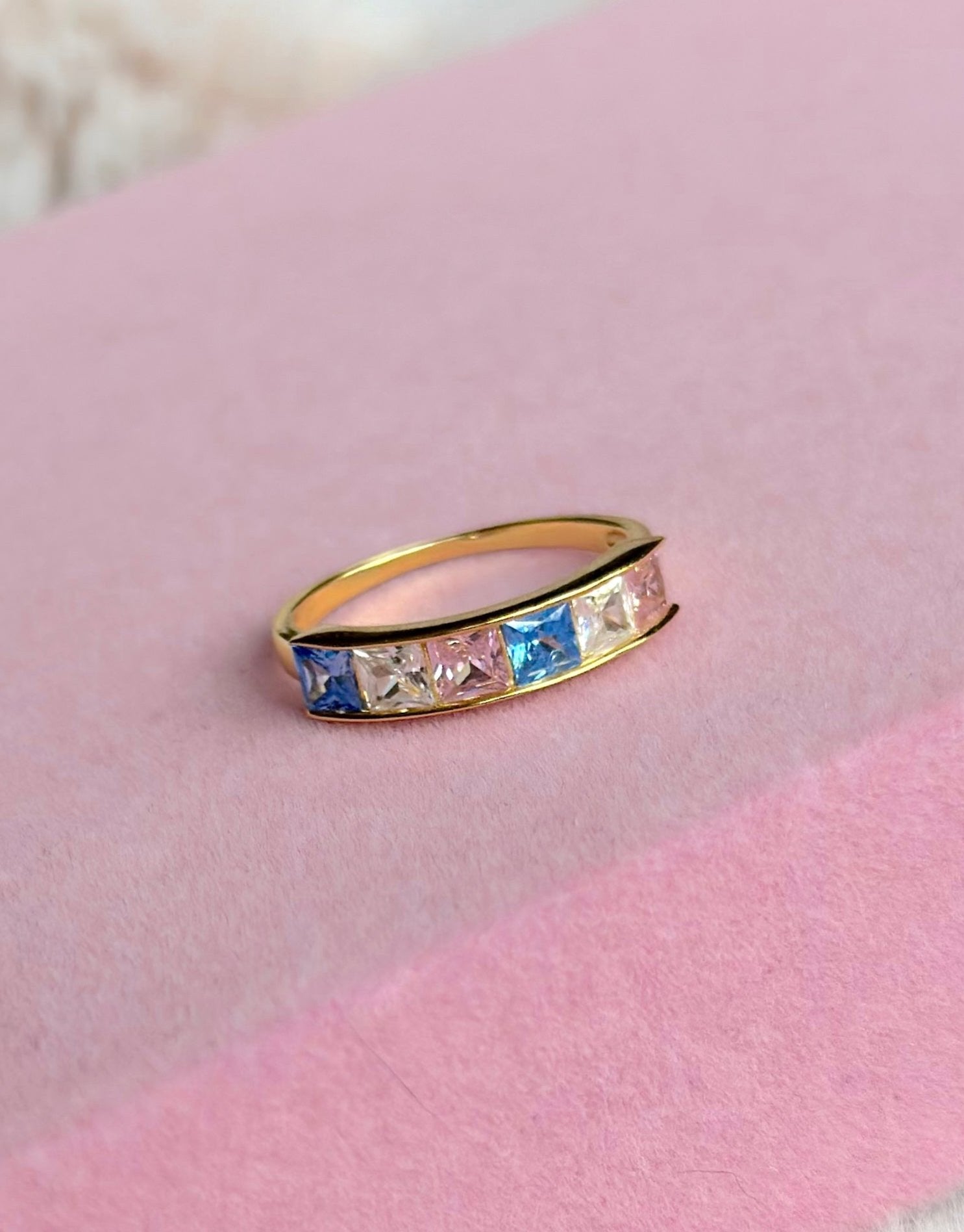 925 sterling silver with 18k gold plating, blue, pink and white cubic zirconia gems. elegant, gold and silver jewellery