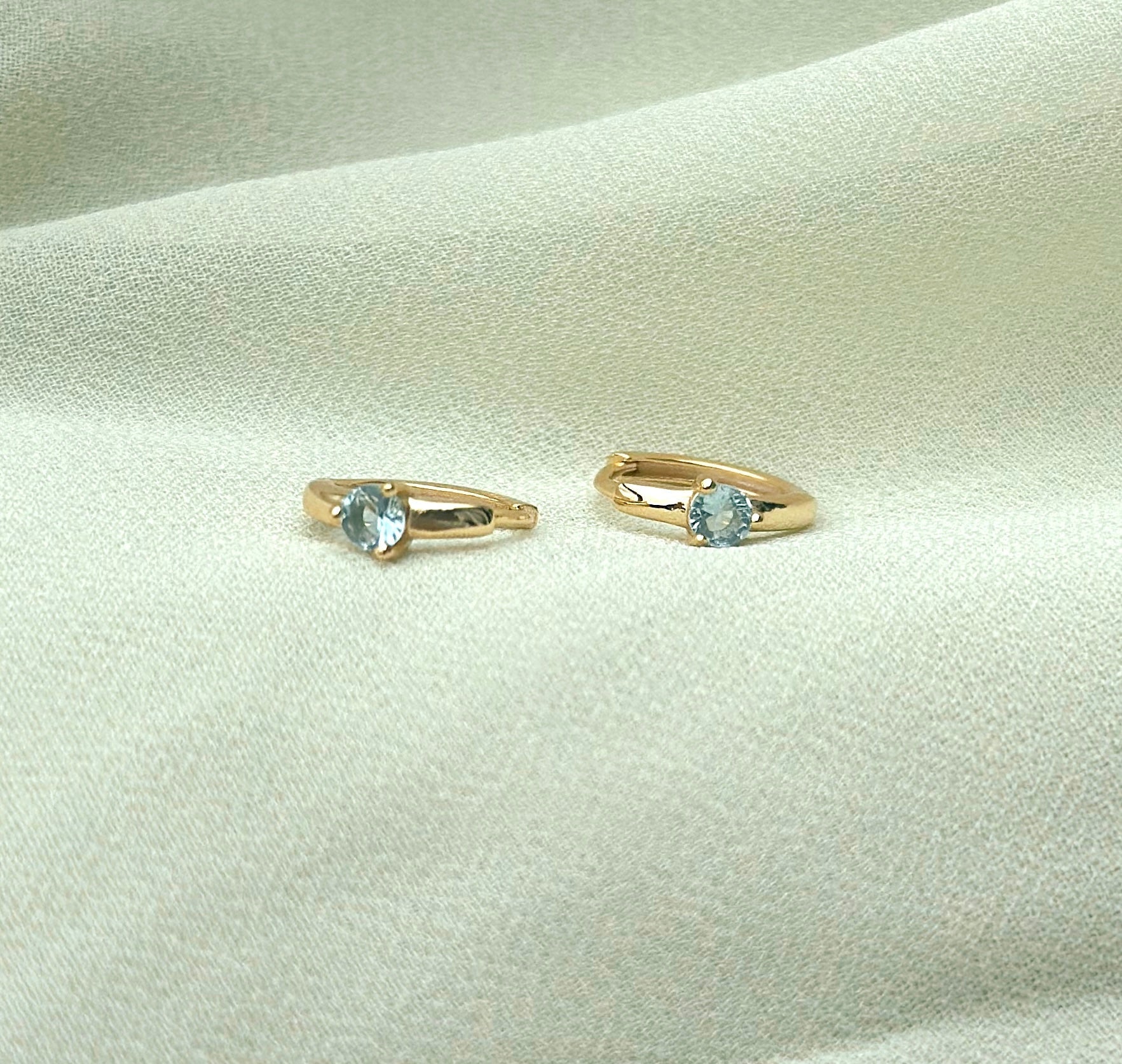 march aquamairine pastel blue birthstone earrings huggies gold plated birthday jewellery